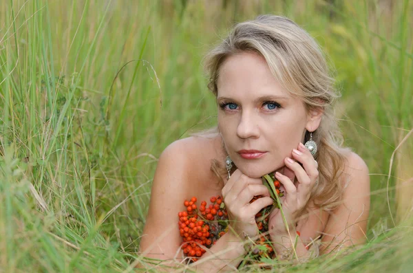 Young woman with rowan — Stock Photo, Image