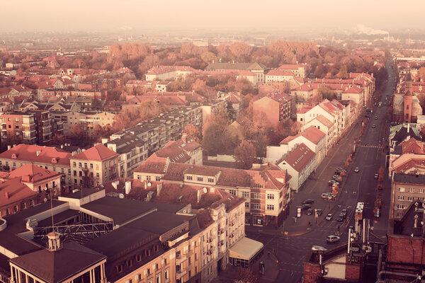 Representative aerial picture of Klaipeda, Lithuania in autumn sunset. Lights of Liepu street.
