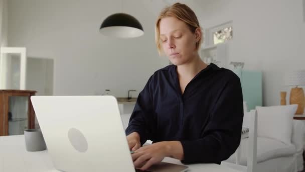 Caucasian female business woman working from home typing report on laptop — Wideo stockowe