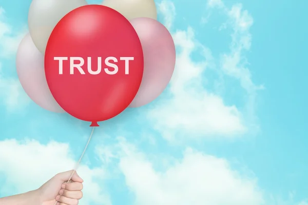 Hand Holding trust Balloon — Stock Photo, Image