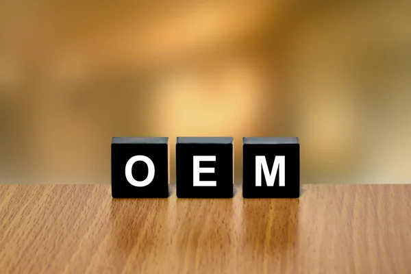 OEM or Original Equipment Manufacturer on black block — Stock Photo, Image