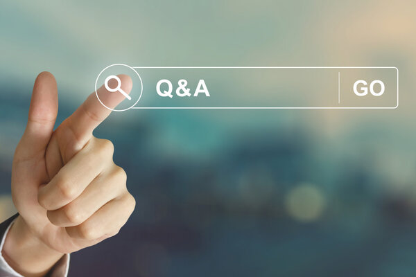 business hand clicking Q & A or Question and Answer button
