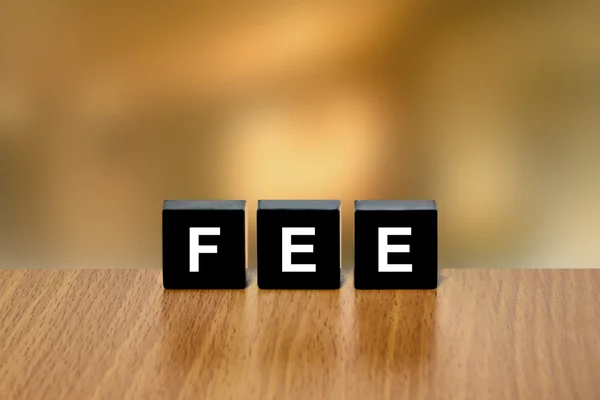 Financial fee on black block — Stock Photo, Image