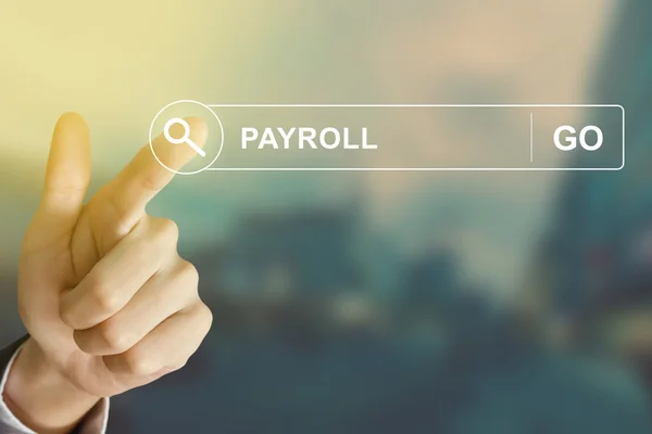 Business hand clicking payroll button on search toolbar — Stock Photo, Image