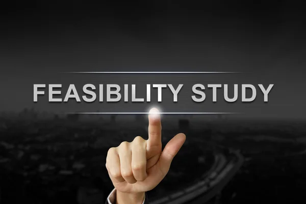Business hand pushing feasibility study button — Stock Photo, Image