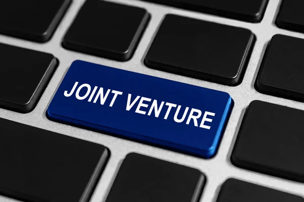 Joint venture-knappen på tangentbordet — Stockfoto