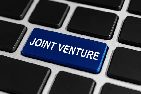 Touche joint venture sur le clavier — Photo