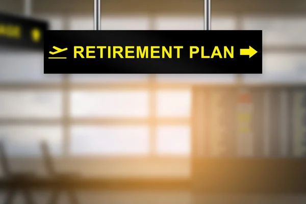 Pensionsplan flygplats tecken ombord — Stockfoto
