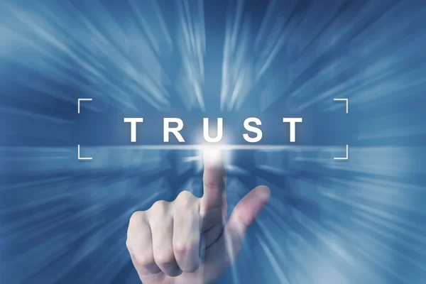 Hand clicking on trust button — Stock Photo, Image