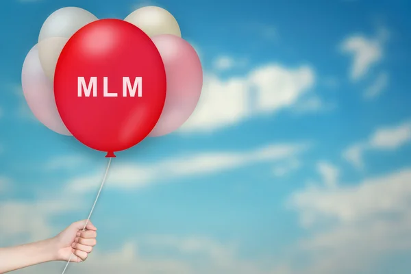 Hand hält mlm oder mehrstufigen Marketing-Ballon — Stockfoto