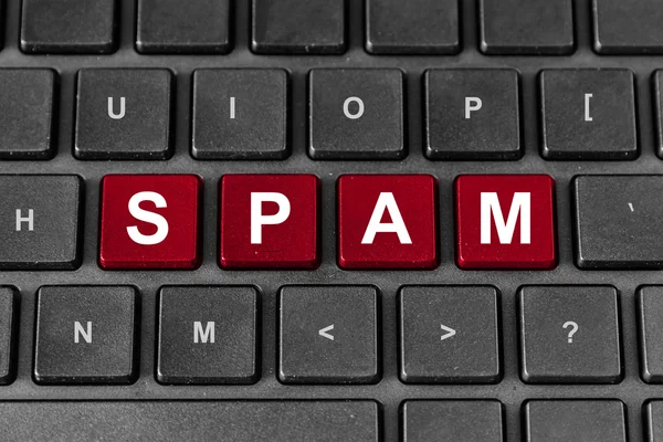 Spam word on keyboard — Stock Photo, Image