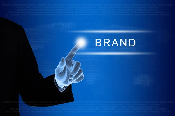 Negócio mão clicando botão marca de marketing na tela sensível ao toque — Fotografia de Stock