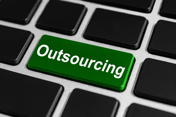 Outsourcing button on keyboard — Stock Photo, Image