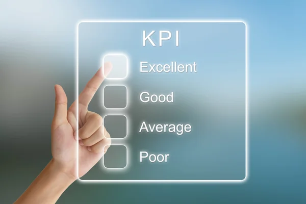 Mão empurrando KPI ou indicador de desempenho chave na tela virtual — Fotografia de Stock