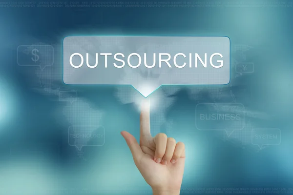 Hand clicking on outsourcing button — Stock Photo, Image