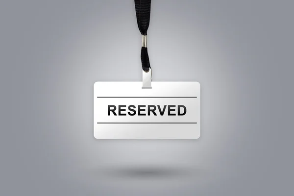 Riservato sul badge — Foto Stock