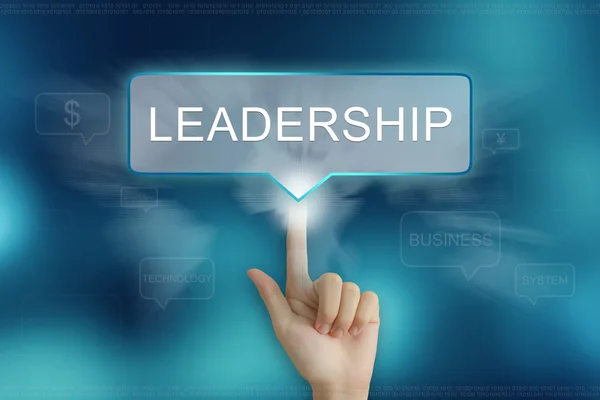 Hand clicking on leadership button — Stock Photo, Image