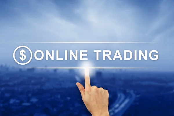 Hand clicking online trading button on touch screen — Stock Photo, Image
