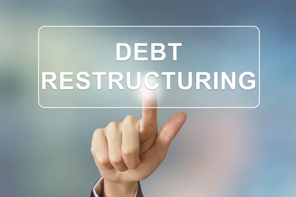 Empresarial mano clic botón de reestructuración de deuda — Foto de Stock