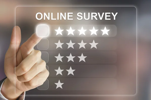 Business hand pushing online survey on virtual screen — Stock Photo, Image