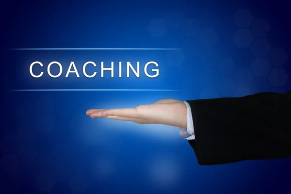 Pulsante di coaching su sfondo blu — Foto Stock