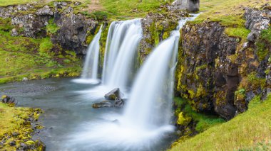 Waterfall at Kirkjufell mountain, Iceland clipart