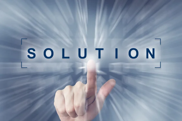 Hand clicking on solution button — Stock Photo, Image