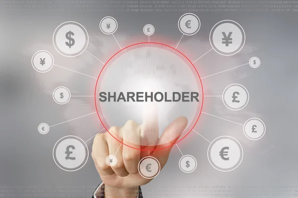 Business hand pushing shareholder button — Stock Photo, Image