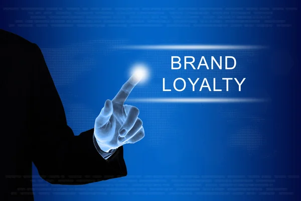Business hand clicking brand loyalty button on touch screen — Stock Photo, Image