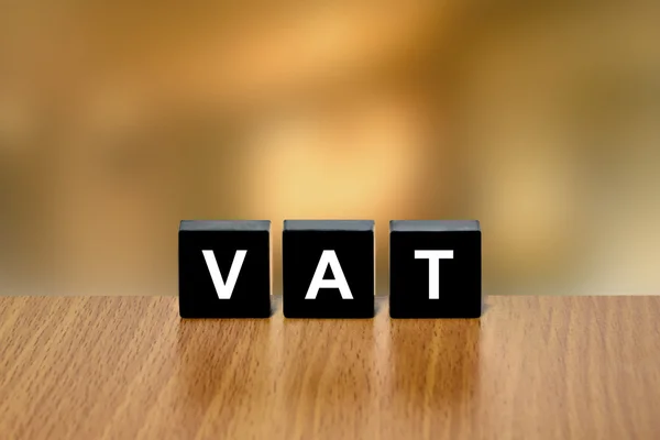 VAT or value added tax on black block — Stock Photo, Image