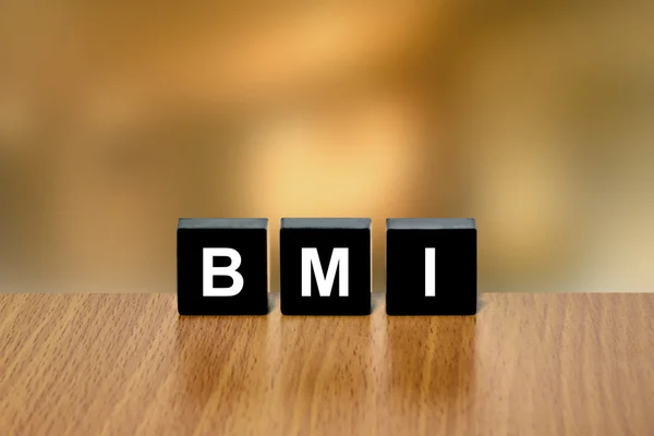 BMI of Body Mass Index op zwarte blok — Stockfoto