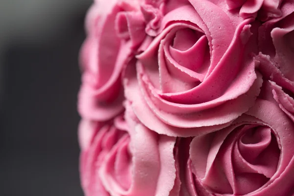 Roze rosette taart Stockafbeelding