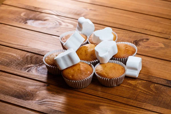 Homemade Muffins Paper Wrap Marshmallows Wooden Board — Stock Photo, Image