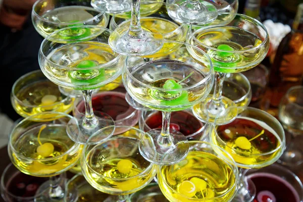 Glass glasses with drinks stand on a table