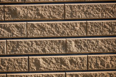 Kahverengi tuğla. Tuğla dokusu, yapı malzemesi, tamir sırasında düz tuğla döşeme.