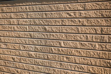 Kahverengi tuğla. Tuğla dokusu, yapı malzemesi, tamir sırasında düz tuğla döşeme.