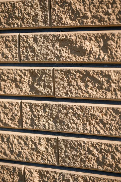 Kahverengi tuğla. Tuğla dokusu, yapı malzemesi, tamir sırasında düz tuğla döşeme.