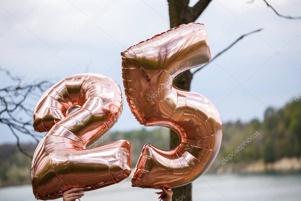 Balloons numbers twenty five in nature