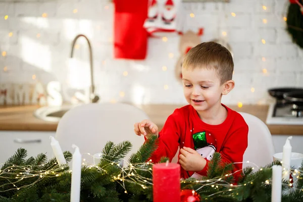 Portrait Boy Sitting Kitchen Christmas Table Which Decorated New Year — Stock Photo, Image