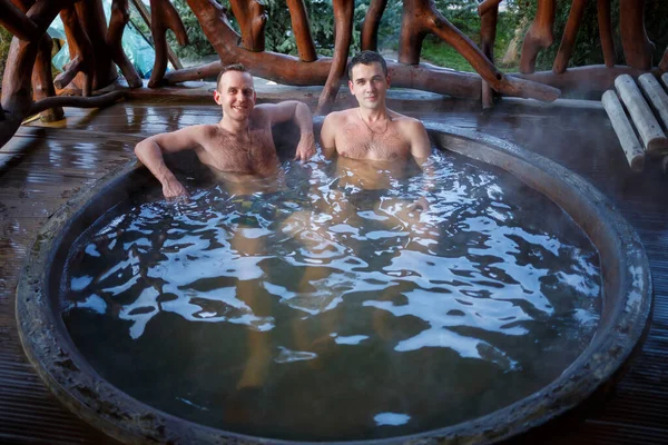 Male Friends Hot Water Pool Terrace Spa Body Treatments Outdoor — Stockfoto