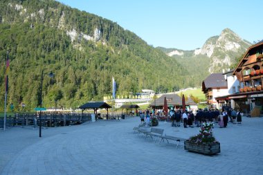 People waiting for boat on quay of Konigssee