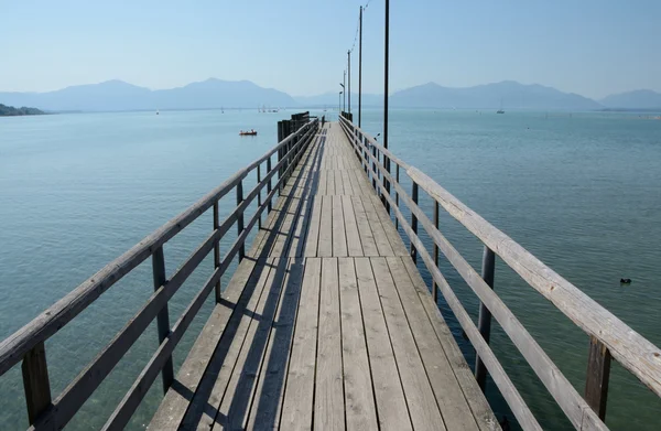 Long wooden pier at Chiemsee lake in Germany — Stock Photo, Image