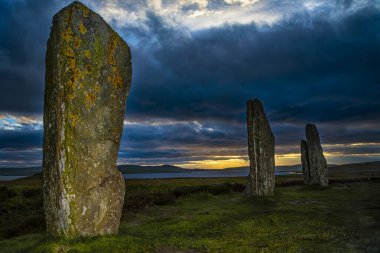 Menhirs on the site of Ring of Brodgar in Scotland clipart