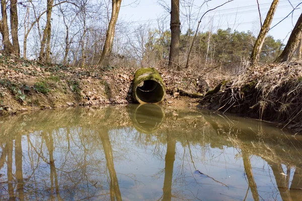 Water drain in a pond