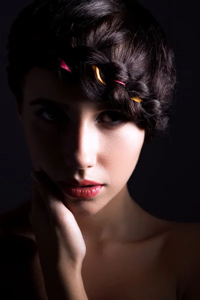 Pretty woman with pigtail aound her head — Stock Photo, Image