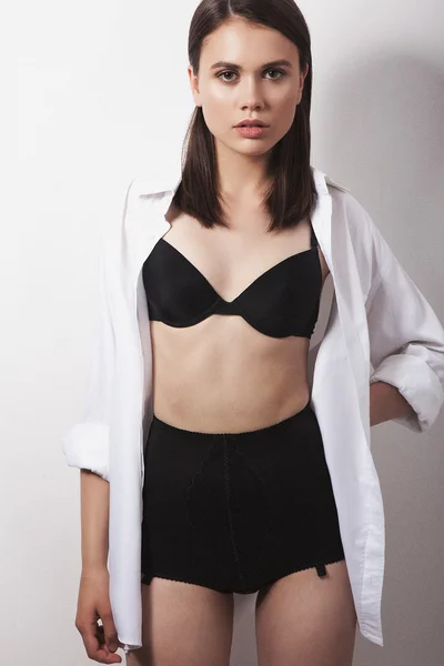 Young female in black underwear — Stock Photo, Image