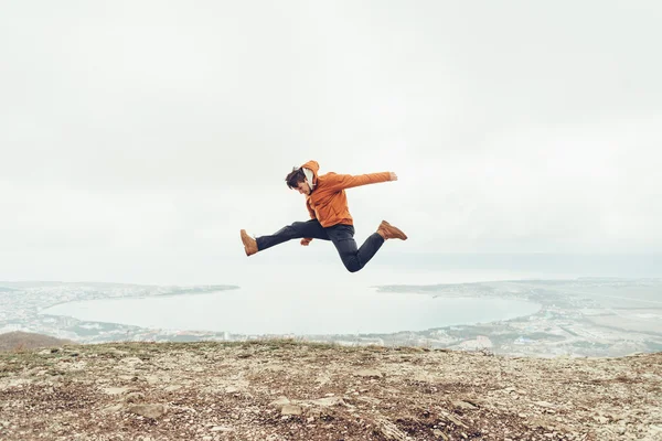 Happy guy jumping outdoor — Stock Photo, Image