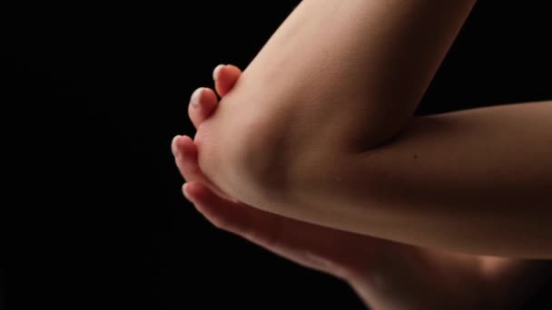 Unrecognizable Woman Massaging Her Elbow Due Acute Pain Black Background — Stock Video