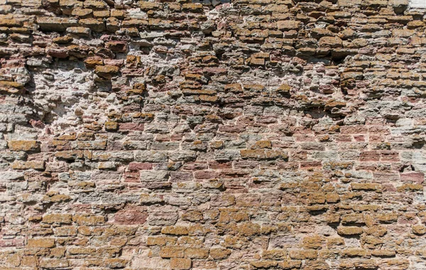 Textura de parede de tijolo quebrado velho. — Fotografia de Stock