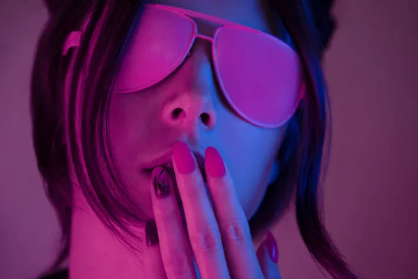 Sensual young woman portrait in pink neon light. — 스톡 사진